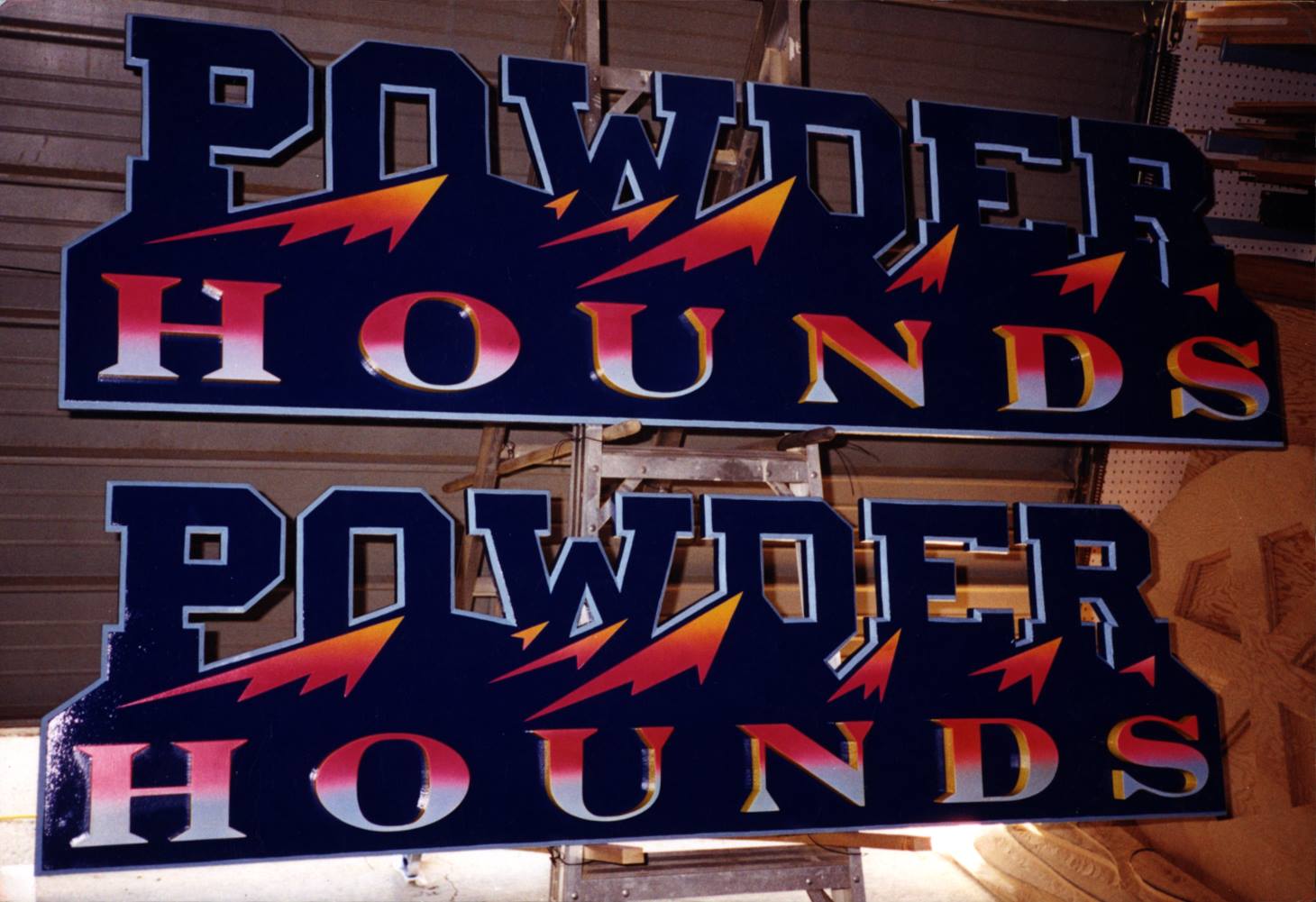 powder hounds vaughn warren sign and graphics